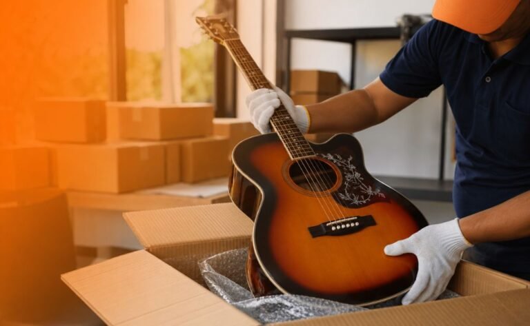 Musical instrument courier service in Chennai with professional guitar and veena packing